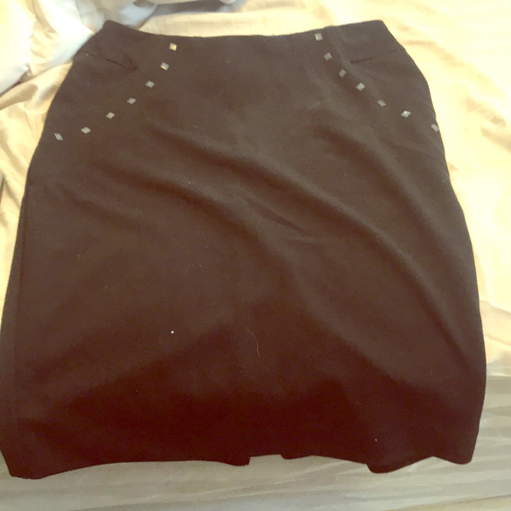 Black studded stretch skirt. Romeo & Juliet Coutur